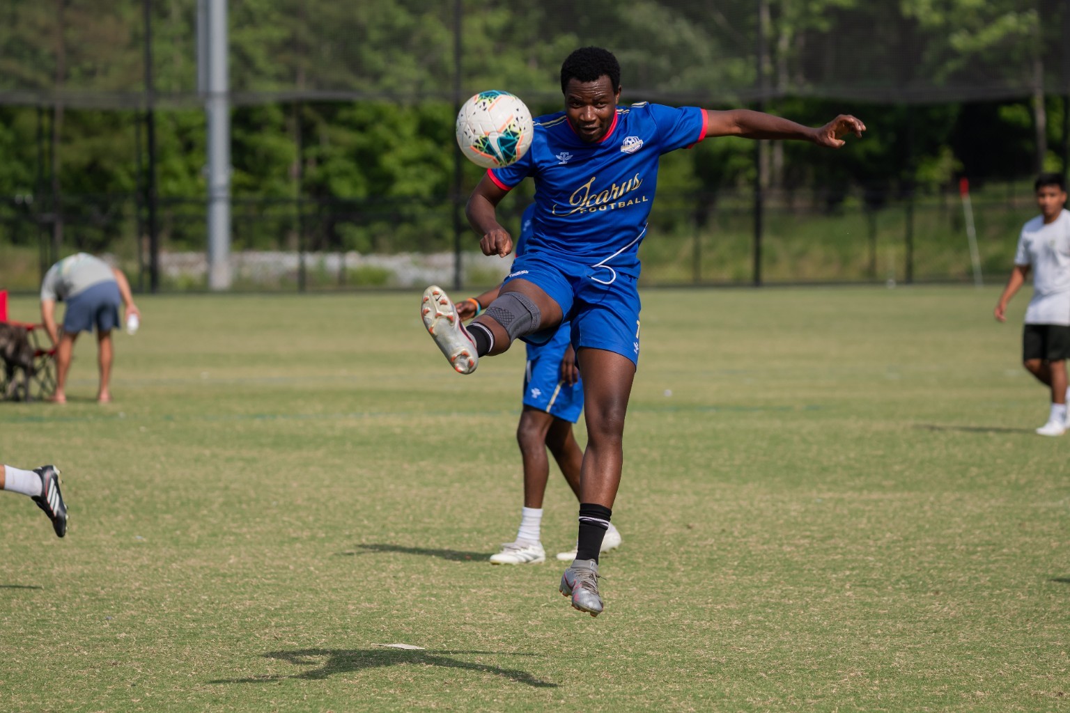 Phantom FC player striking the ball