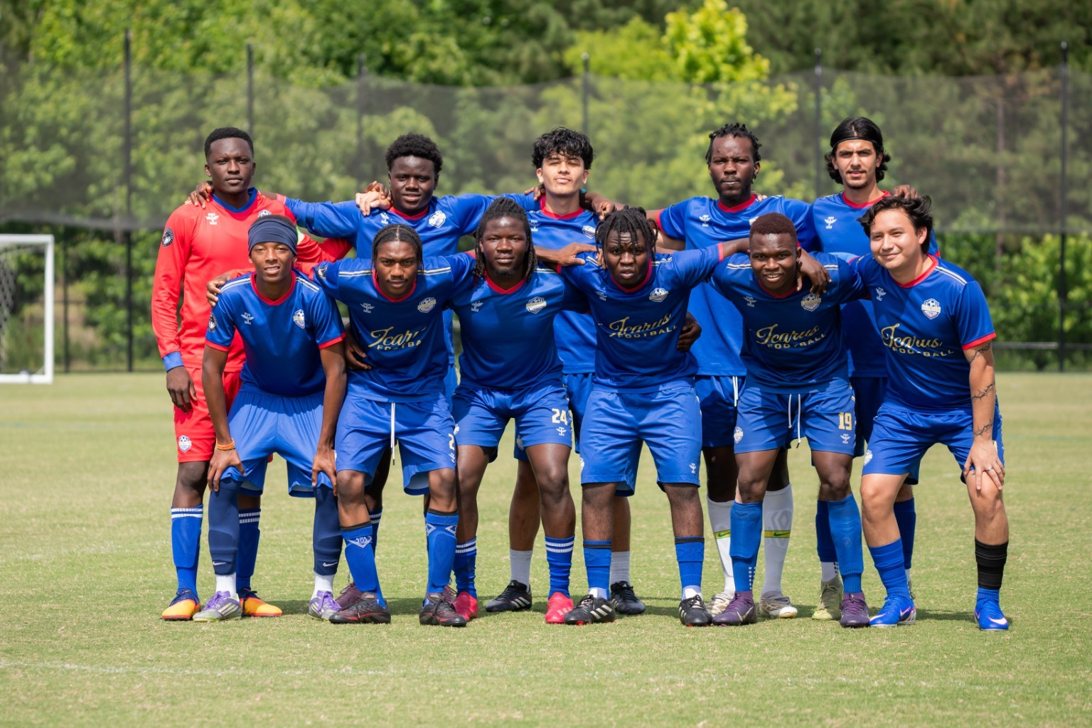Phantom FC starting eleven standing together before kickoff